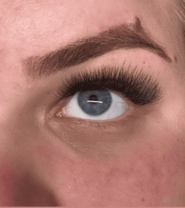 Close-up of blue eye with long eyelashes